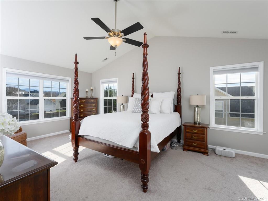 121 Haw River Road Fletcher, NC 28732 - Photo 20 of 42 a bed room with a bed and a window