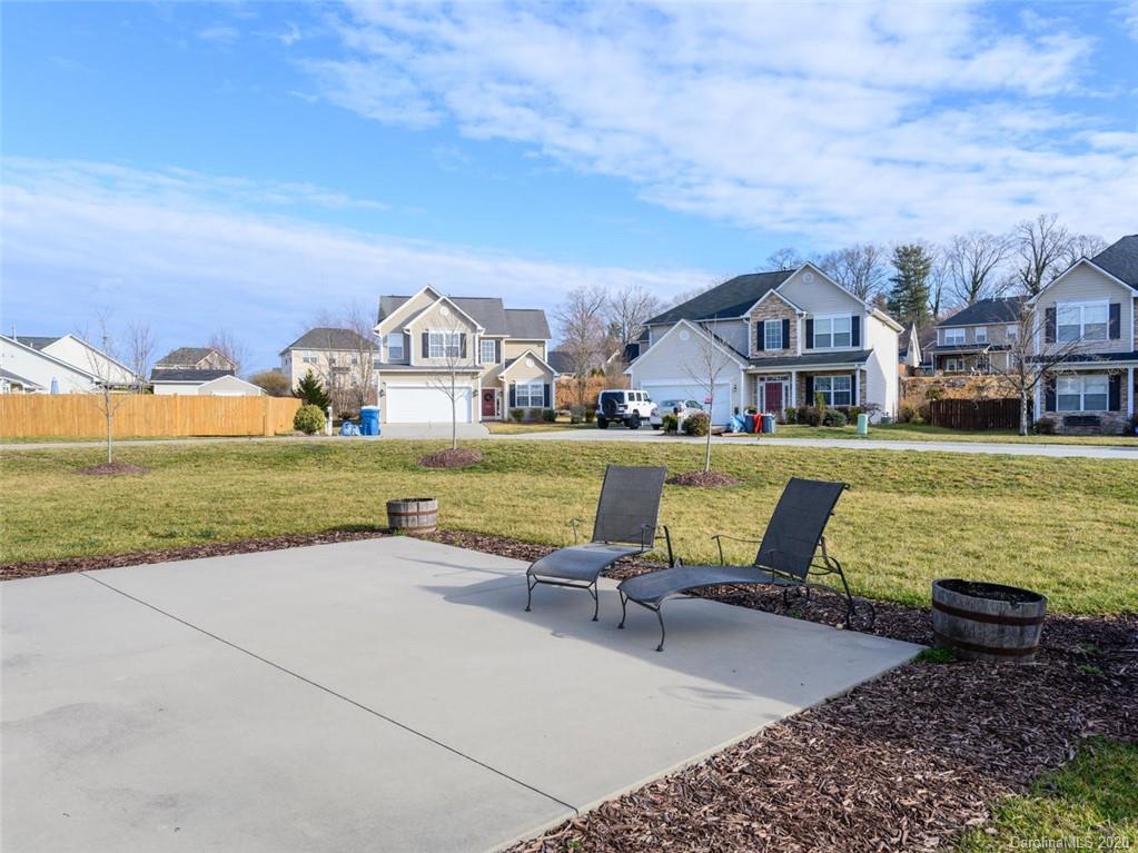 121 Haw River Road Fletcher, NC 28732 - Photo 27 of 42 a view of a house with garden and a yard
