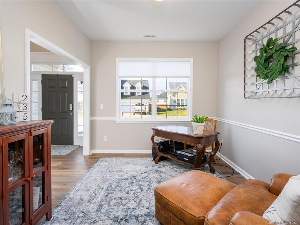 121 Haw River Road Fletcher, NC 28732 - Photo 6 of 42 a living room with furniture and a window