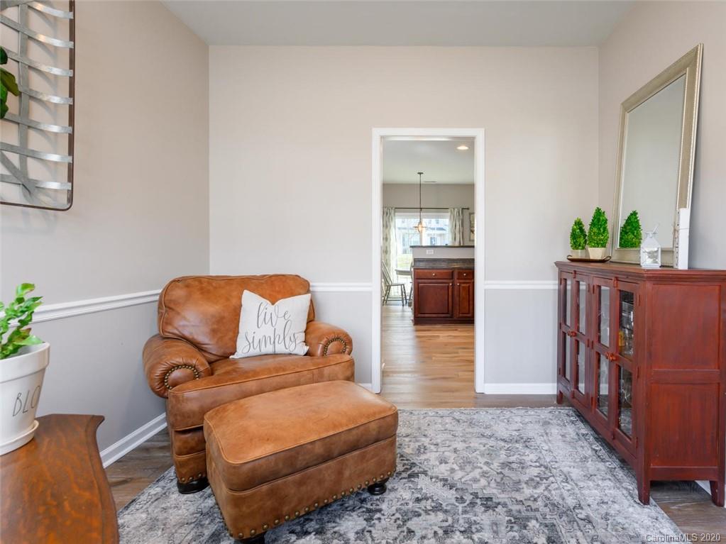 121 Haw River Road Fletcher, NC 28732 - Photo 7 of 42 a living room with furniture and wooden floor