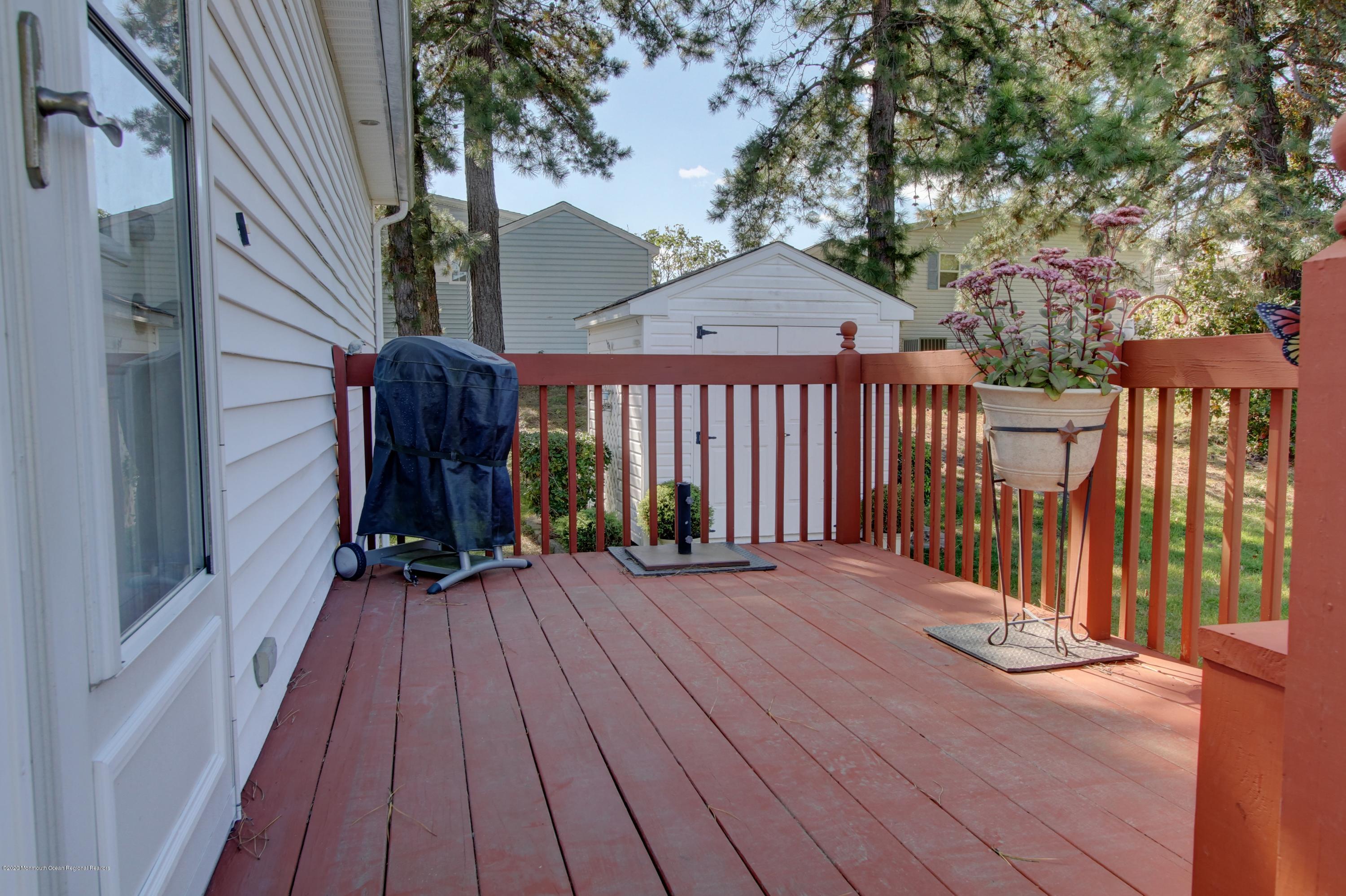 913 Oak Ridge Terrace Whiting, NJ 08759 - Photo 18 of 23 Side House Deck