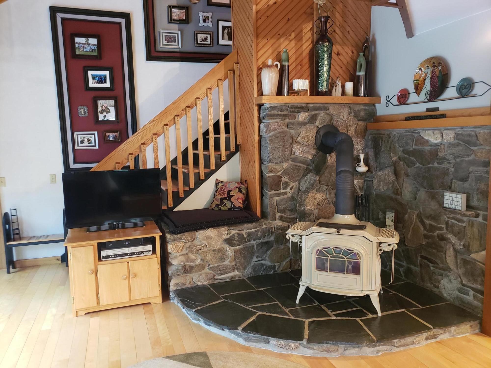 141 Warren Hill Road Jay, ME 04239 - Photo 34 of 101 Wood stove with stone & slate hearth.