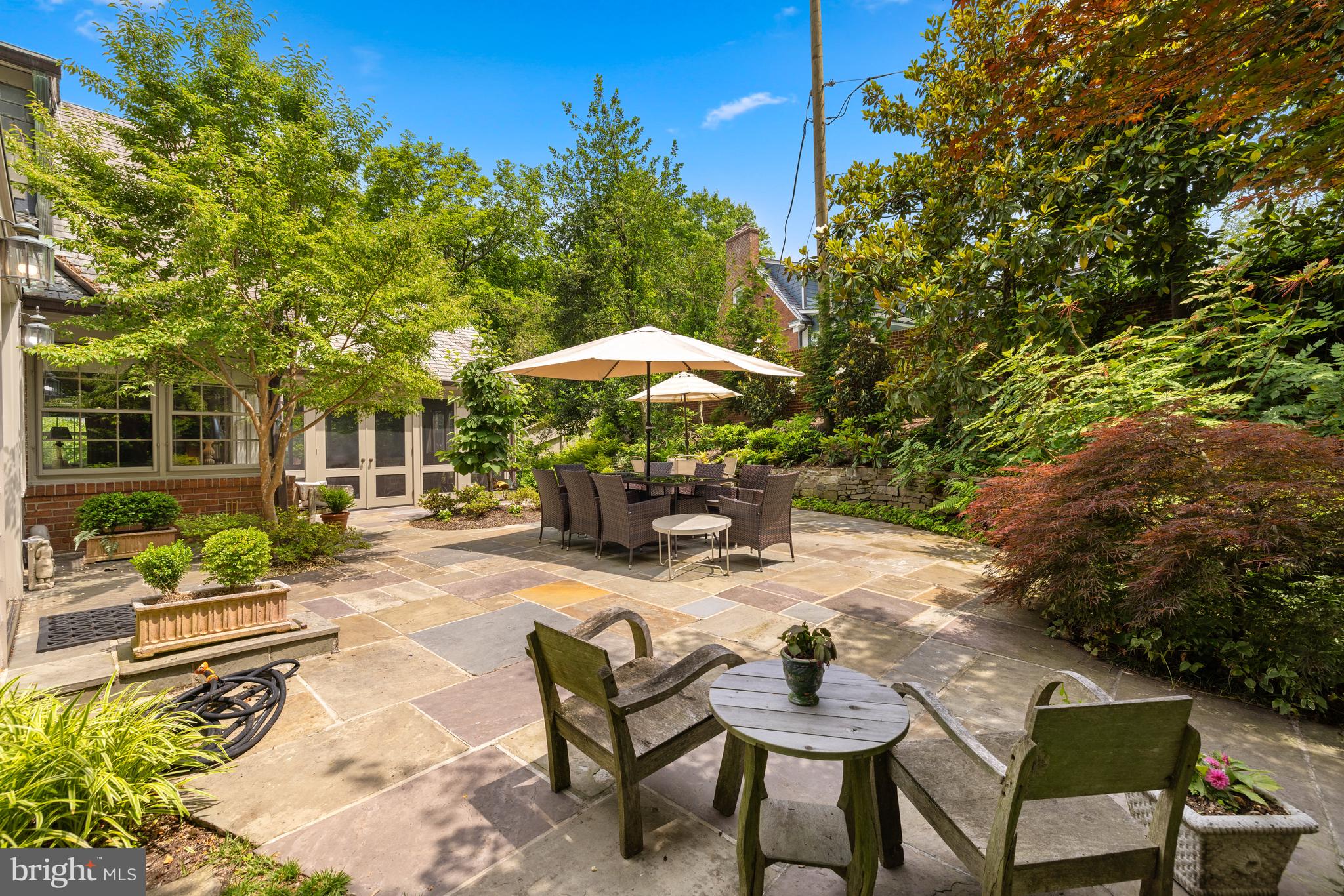 5060 Overlook Road Northwest Washington, DC 20016 - Photo 5 of 12 Expansive Flagstone Patio