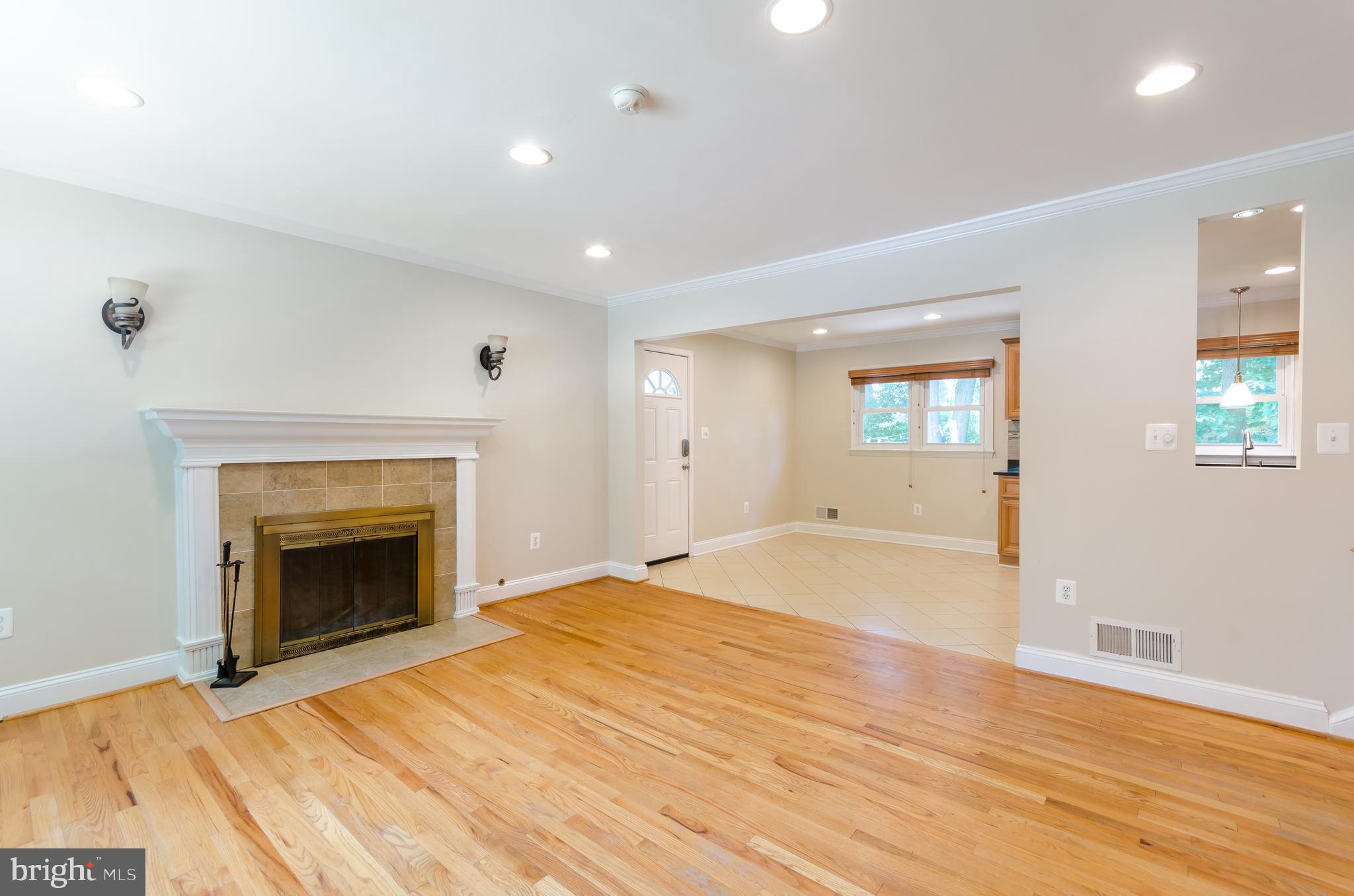 7128 Layton Drive Springfield, VA 22150 - Photo 4 of 28 Gas Fireplace in the living room.