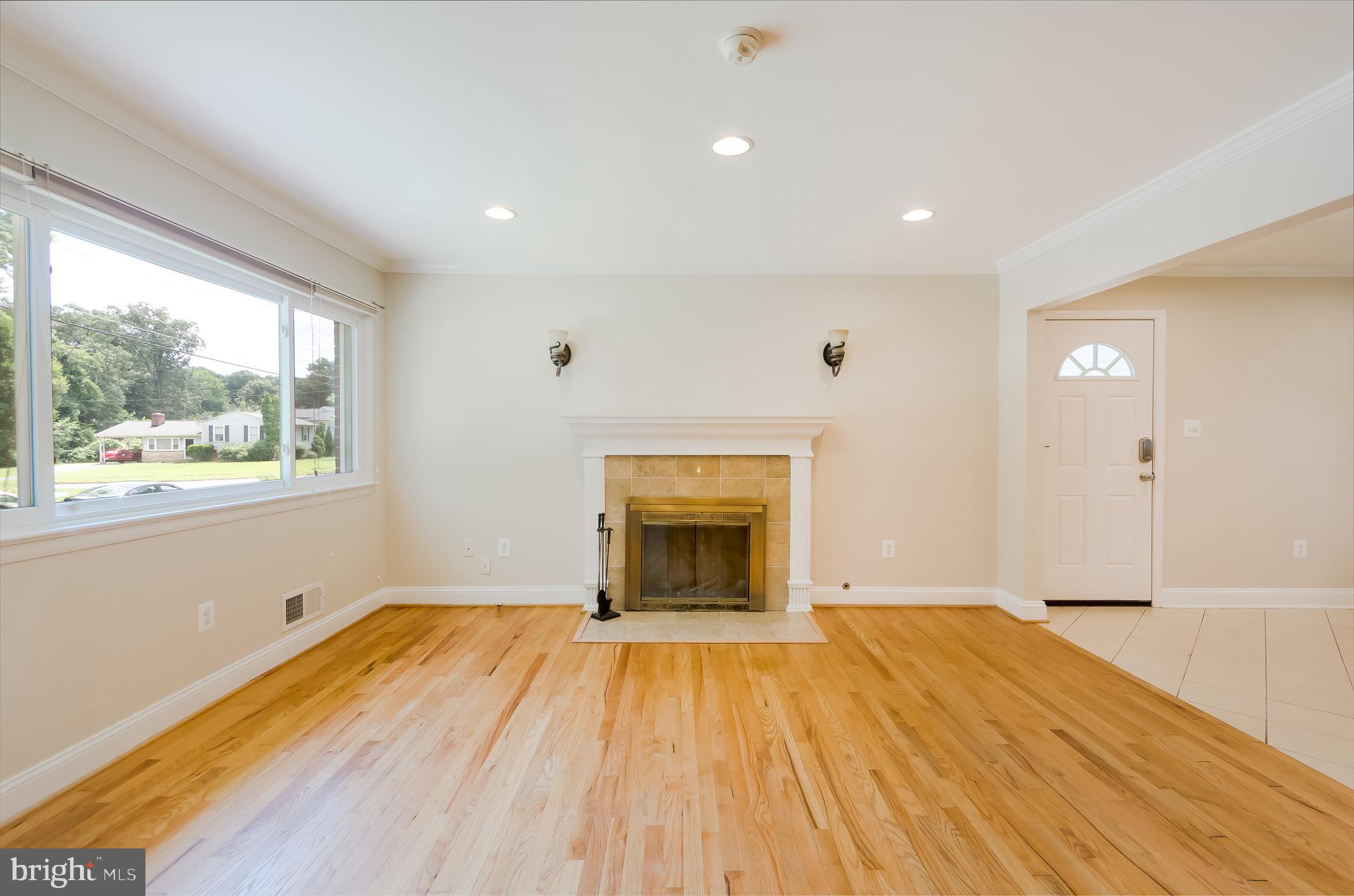 7128 Layton Drive Springfield, VA 22150 - Photo 5 of 28 Gas Fireplace in the living room