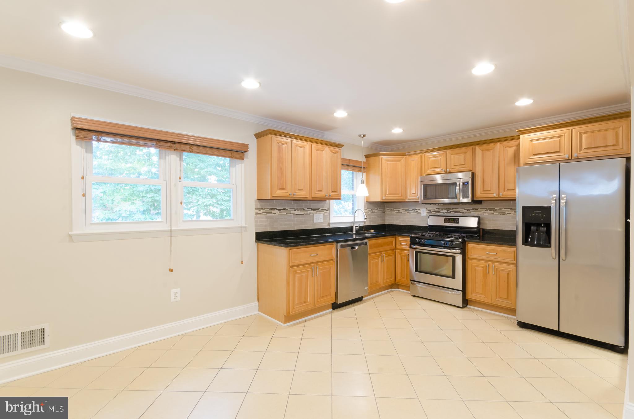 7128 Layton Drive Springfield, VA 22150 - Photo 7 of 28 Kitchen with Stainless Steele Applicances