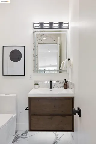 a bedroom with a large bed and a large window