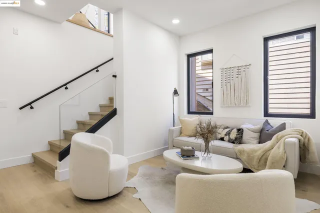 a bedroom with a bed and a lamp