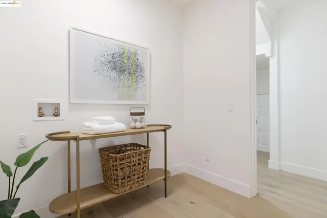 a bedroom with a bed and a chair