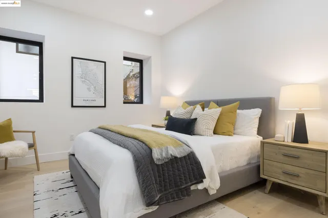 a bedroom with a bed and a table in it