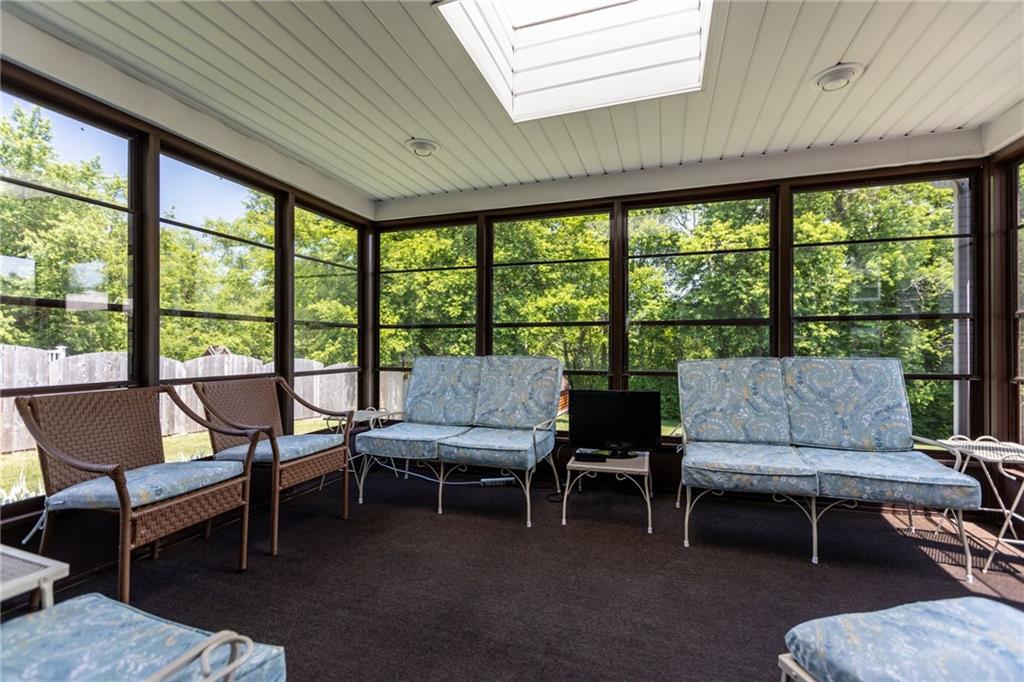 136 Lakeview Drive McKees Rocks, PA 15136 - Photo 12 of 24 a living room with furniture and a large window