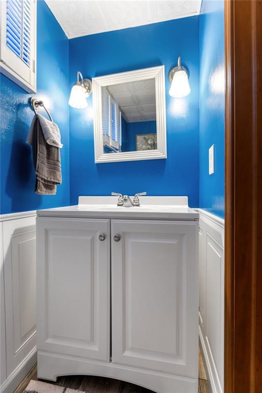 136 Lakeview Drive McKees Rocks, PA 15136 - Photo 23 of 24 a bathroom with a sink vanity and mirror