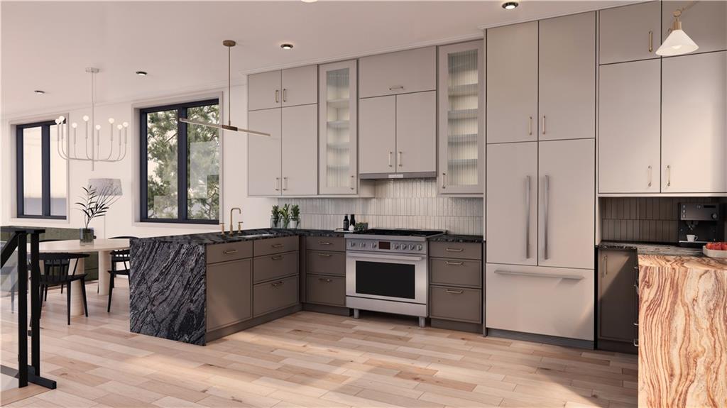 132 Prospect Street Mount Washington, PA 15211 - Photo 11 of 19 a kitchen with stainless steel appliances granite countertop a stove a sink and a refrigerator