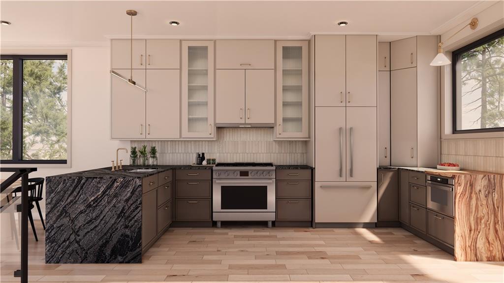 132 Prospect Street Mount Washington, PA 15211 - Photo 13 of 19 a kitchen with stainless steel appliances granite countertop a stove a sink and a refrigerator