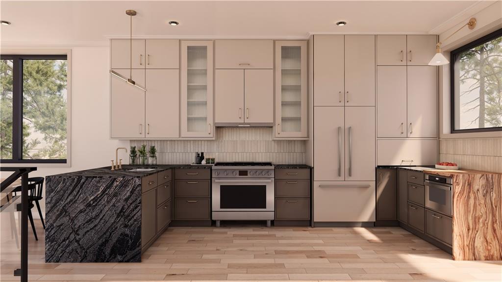 132 Prospect Street Mount Washington, PA 15211 - Photo 15 of 19 a kitchen with stainless steel appliances granite countertop a stove a sink and a refrigerator