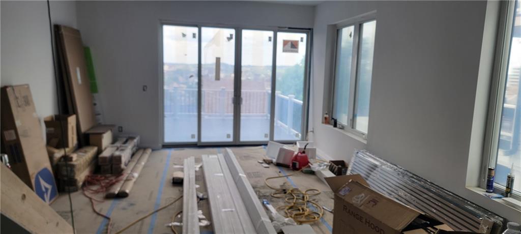 132 Prospect Street Mount Washington, PA 15211 - Photo 23 of 25 a view of a living room and a floor to ceiling window