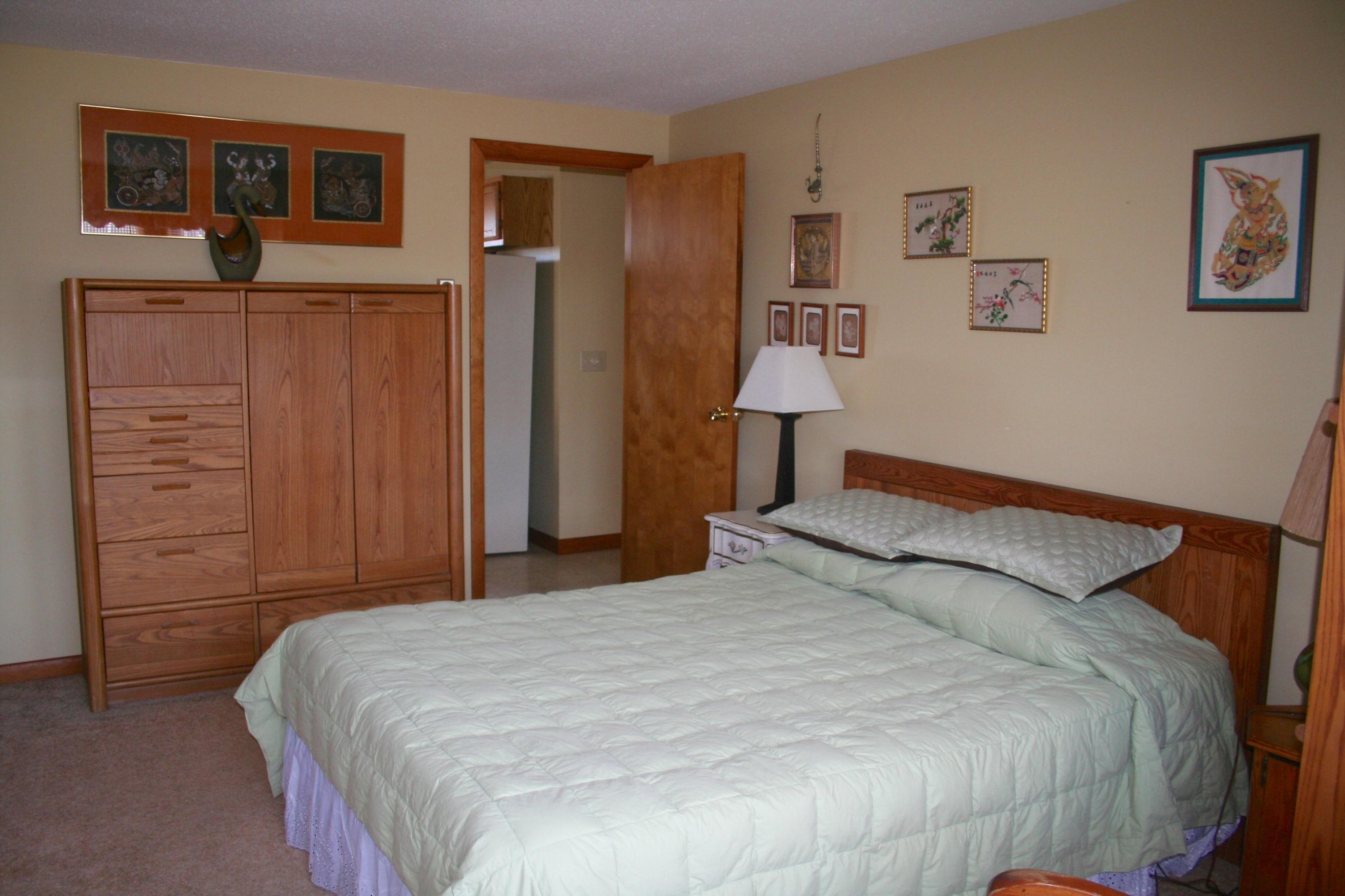 559 Shore Road Truro, MA 02666 - Photo 7 of 9 a bedroom with a bed and a closet