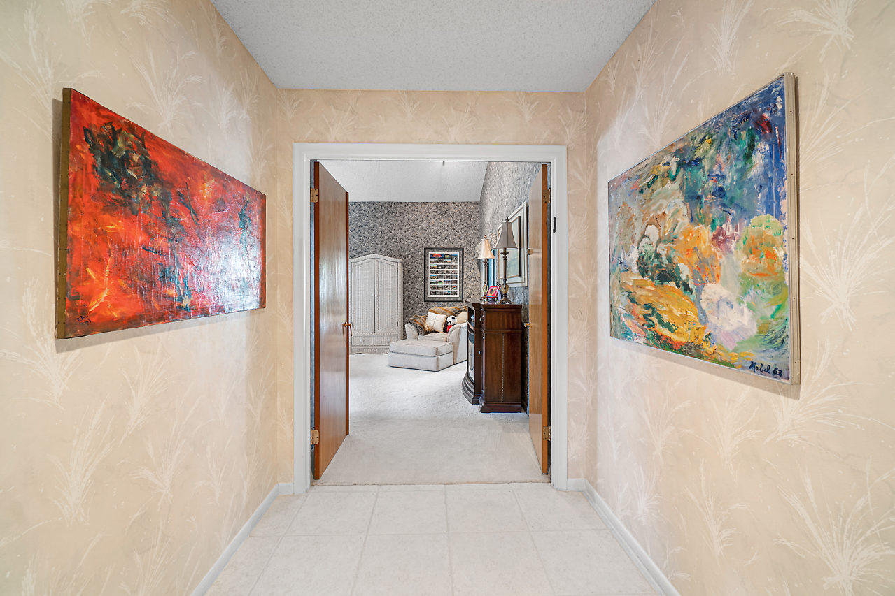 3745 Northwest 23rd Court Boca Raton, FL 33431 - Photo 23 of 36 HALLWAY TO MASTER BEDROOM