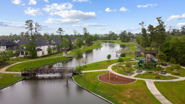 a view of a lake with a house in the background