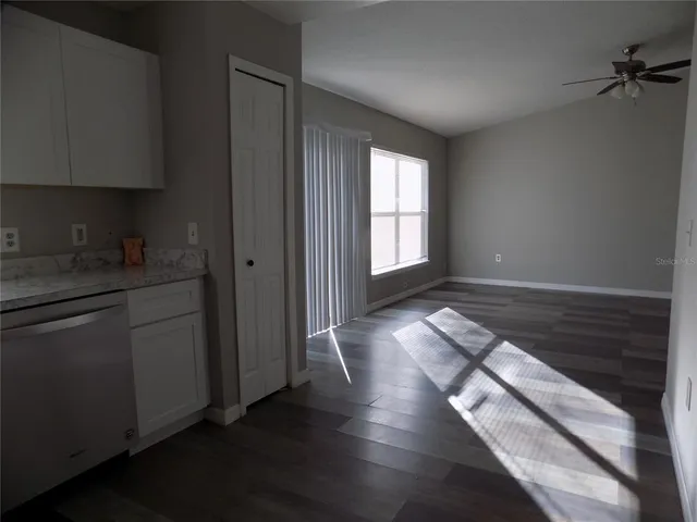 a view of entryway with wooden floor