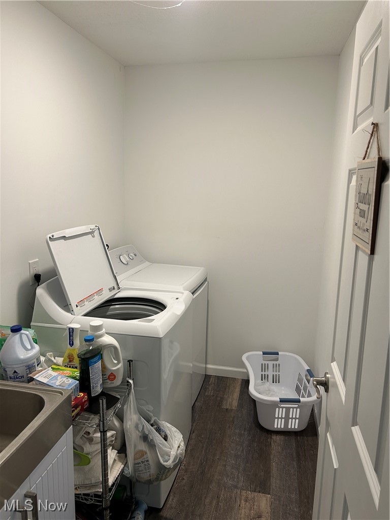 3005 Bardshar Road Sandusky, OH 44870 - Photo 18 of 24 Clothes washing area with washer and dryer, wood finished floors, and laundry area