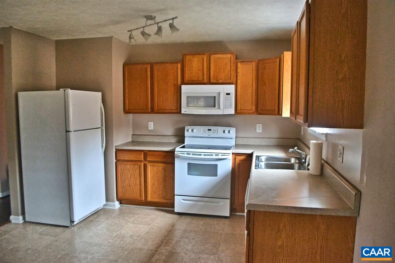 252 Rochelle School Lane Rochelle, VA 22738 - Photo 2 of 17 a kitchen with stainless steel appliances granite countertop a refrigerator and a sink