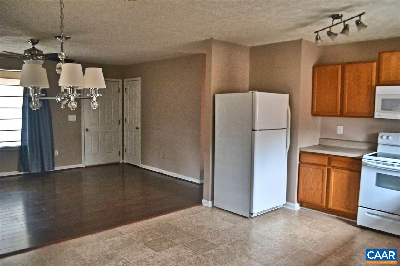 252 Rochelle School Lane Rochelle, VA 22738 - Photo 5 of 17 a view of a kitchen with a refrigerator a sink dishwasher and a refrigerator