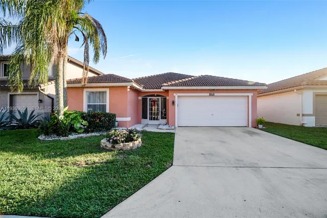 $540,000 | 8165 Pelican Harbour Drive, Lake Worth, FL 33467