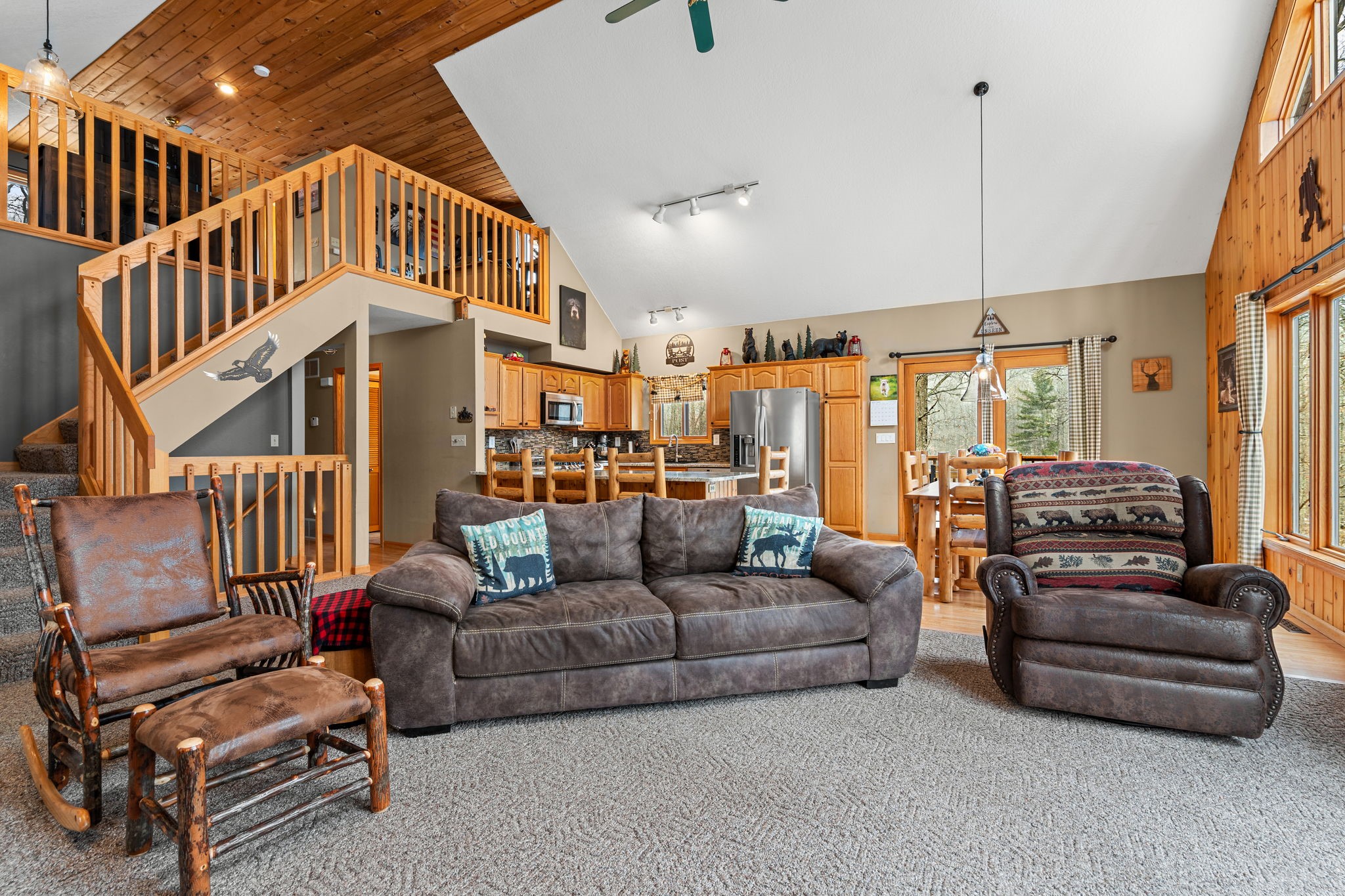 1388 West Town Hall Road Springbrook, WI 54875 - Photo 10 of 55 Main level leads up to the open master suite loft and sitting area.