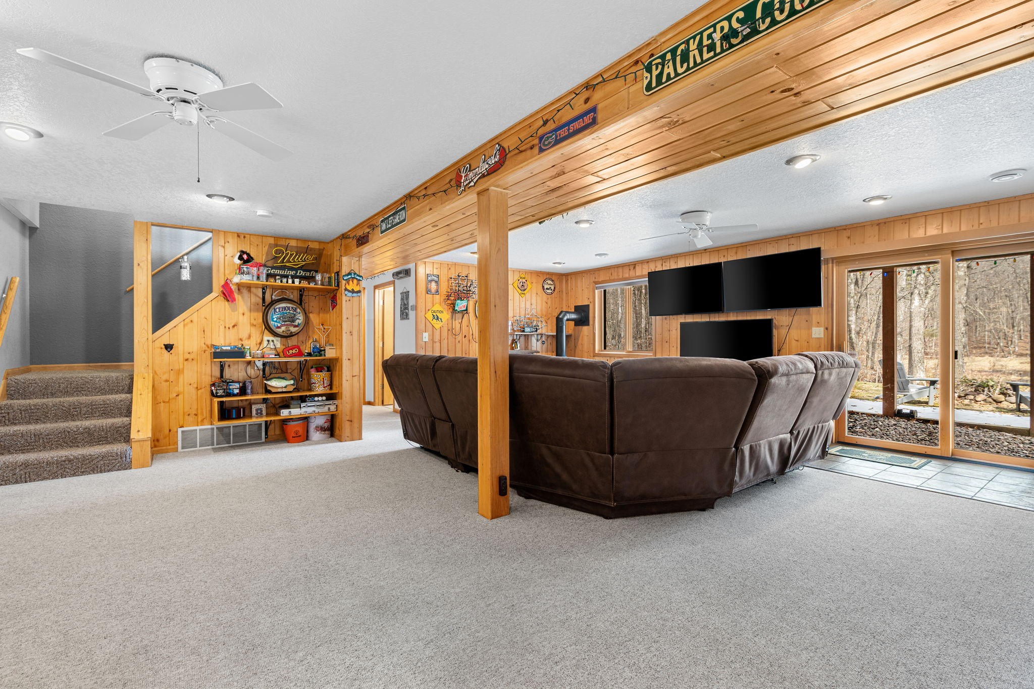 1388 West Town Hall Road Springbrook, WI 54875 - Photo 28 of 55 Spacious and inviting lower-level family room walkout.
