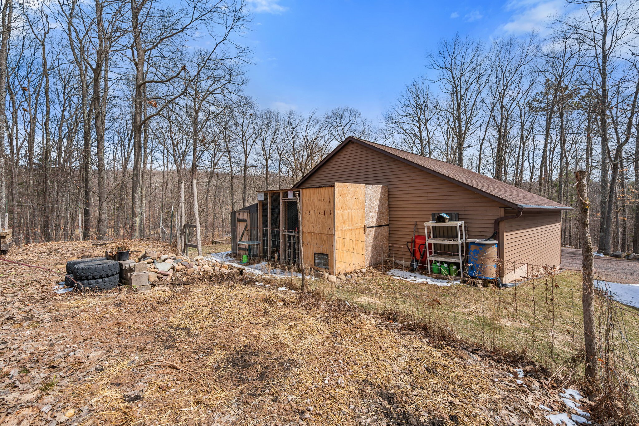 1388 West Town Hall Road Springbrook, WI 54875 - Photo 37 of 55 Backside of the garage includes a chicken coop.