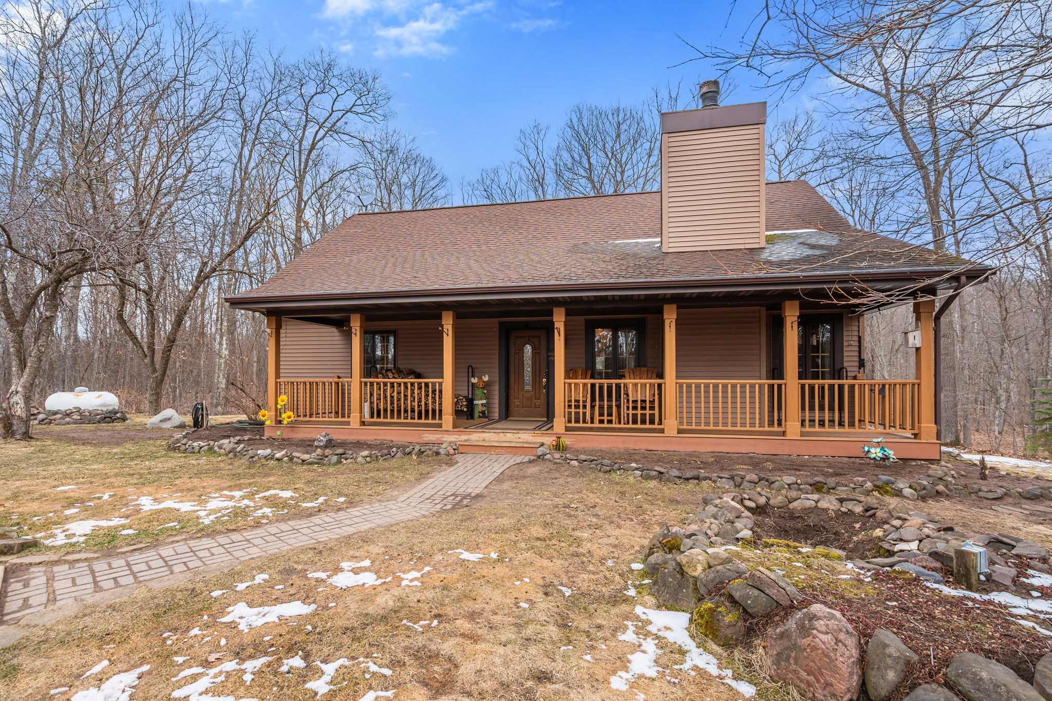 1388 West Town Hall Road Springbrook, WI 54875 - Photo 4 of 55 Warm and inviting front porch and composite decking.
