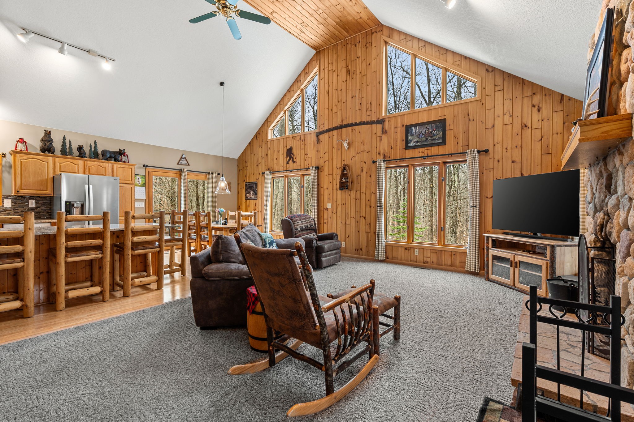 1388 West Town Hall Road Springbrook, WI 54875 - Photo 55 of 55 Enter into this open floorplan flooded with natural light and vaulted ceilings.