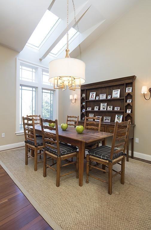 100 Westcliff Road Weston, MA 02493 - Photo 16 of 42 a dining room with furniture and chandelier