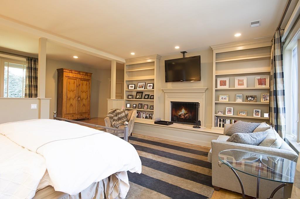 100 Westcliff Road Weston, MA 02493 - Photo 20 of 42 a living room with furniture fireplace and flat screen tv