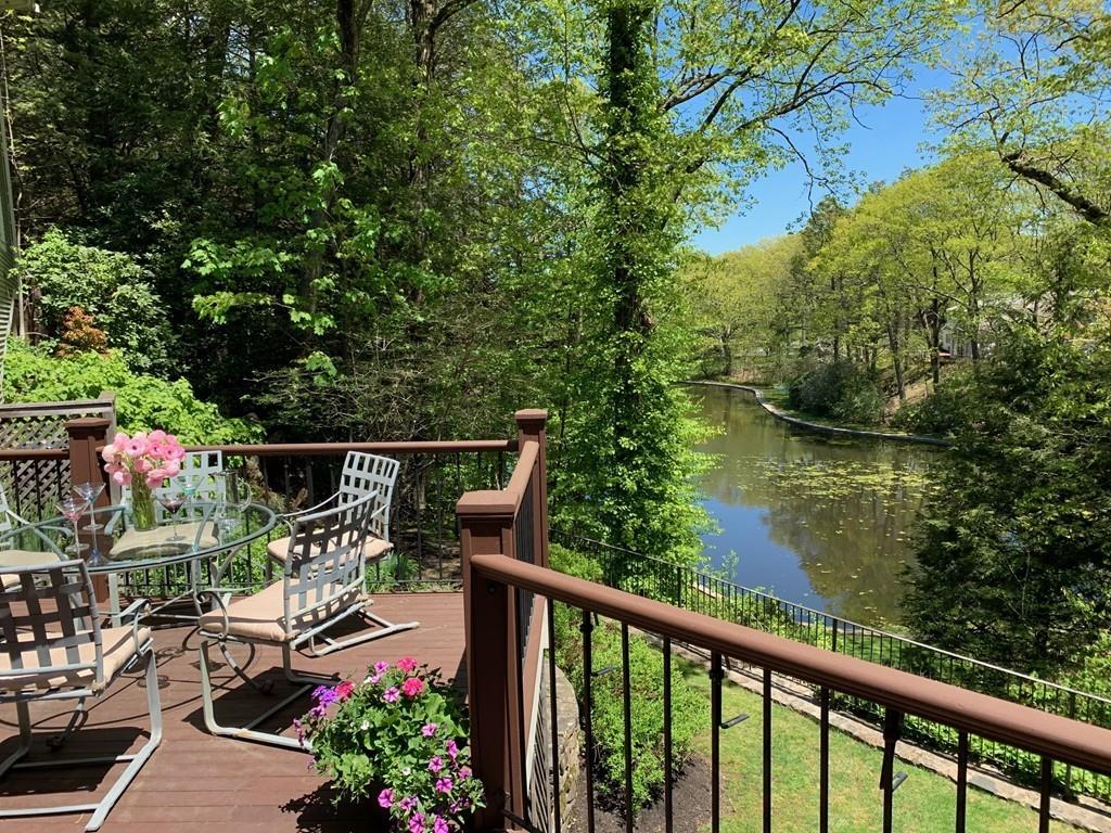 100 Westcliff Road Weston, MA 02493 - Photo 2 of 42 a view of a balcony with chairs