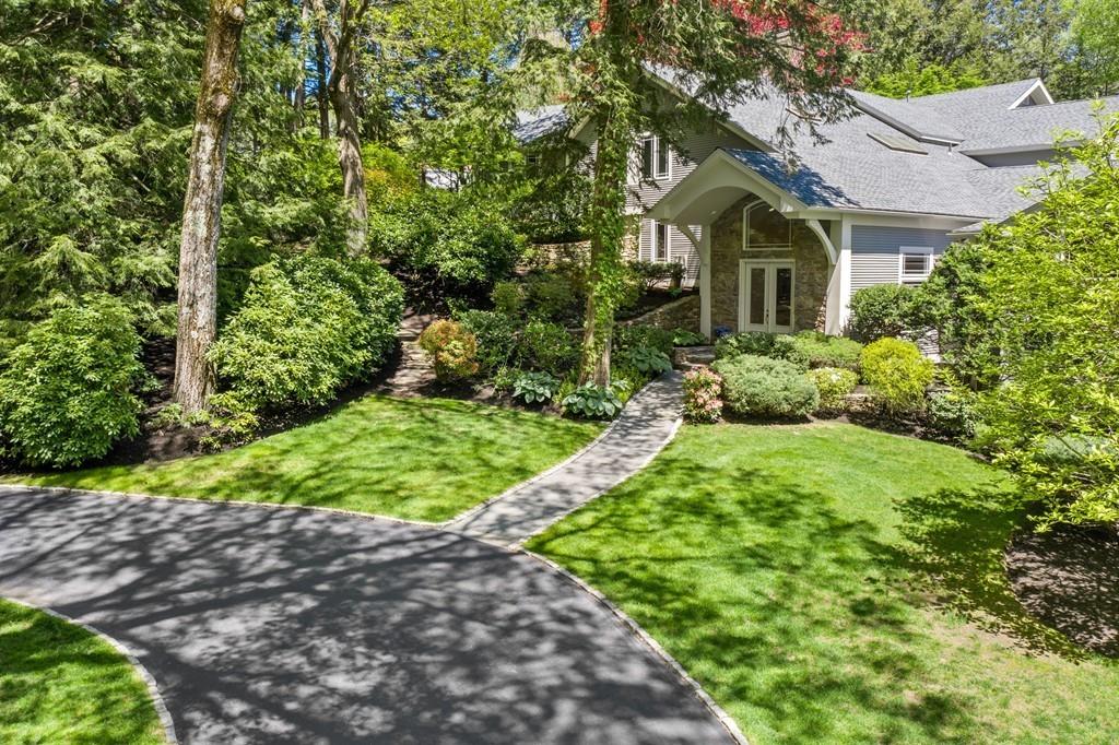 100 Westcliff Road Weston, MA 02493 - Photo 27 of 42 a front view of a house with a yard