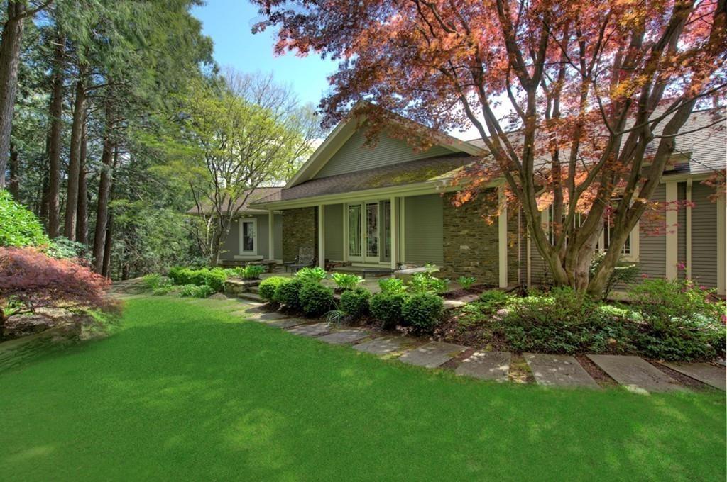 100 Westcliff Road Weston, MA 02493 - Photo 32 of 42 a front view of a house with garden