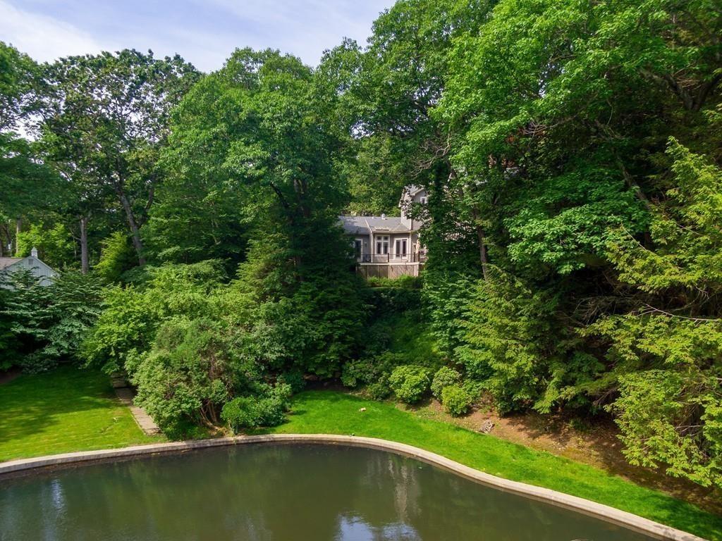 100 Westcliff Road Weston, MA 02493 - Photo 35 of 42 a view of a garden with a lake view