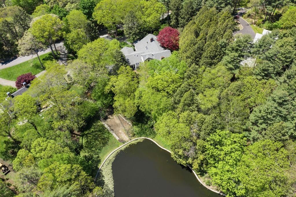 100 Westcliff Road Weston, MA 02493 - Photo 39 of 42 a view of a house with a yard and plants