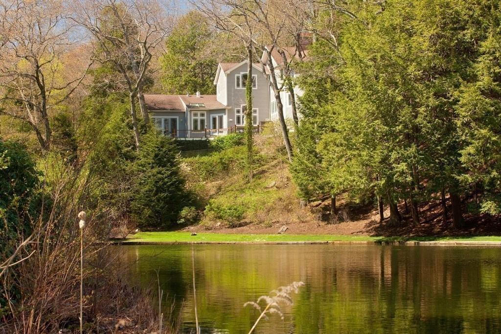 100 Westcliff Road Weston, MA 02493 - Photo 41 of 42 a view of a house with a yard