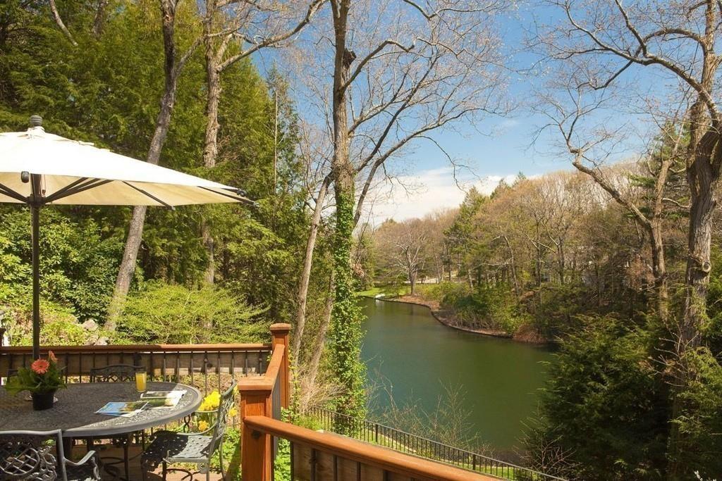 100 Westcliff Road Weston, MA 02493 - Photo 42 of 42 a view of a lake from a balcony