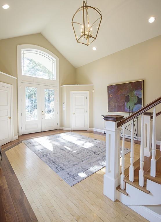 100 Westcliff Road Weston, MA 02493 - Photo 6 of 42 a view of empty room with wooden floor and fan