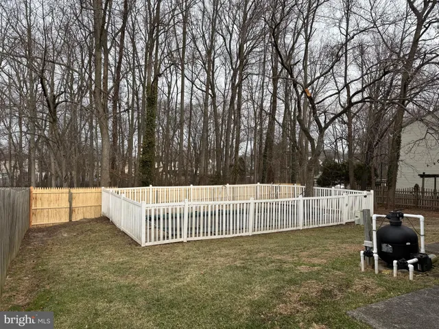 a view of a deck with a fence