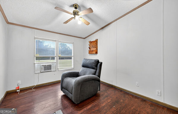 1090 South Hampton Road Hampton, GA 30228 - Photo 16 of 21 a living room with furniture and a window