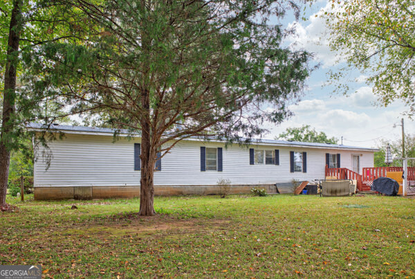 1090 South Hampton Road Hampton, GA 30228 - Photo 20 of 21 a front view of house with yard and green space