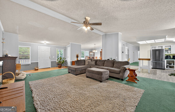 1090 South Hampton Road Hampton, GA 30228 - Photo 6 of 21 a living room with furniture and a couch