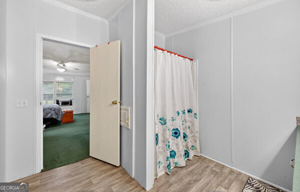 1090 South Hampton Road Hampton, GA 30228 - Photo 10 of 21 a view of an entryway with wooden floor