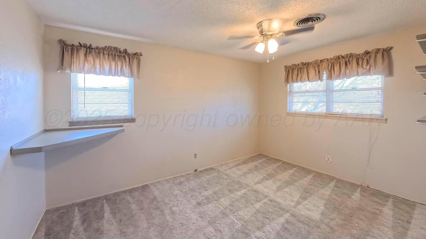 5015 Southwest 53rd Avenue Amarillo, TX 79109 - Photo 15 of 26 a view of an empty room with a window