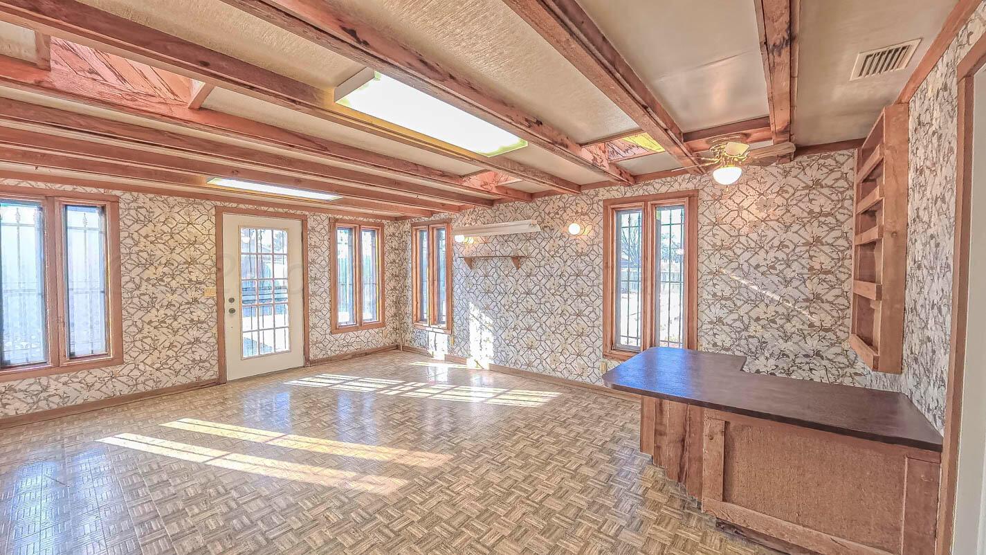 5015 Southwest 53rd Avenue Amarillo, TX 79109 - Photo 19 of 26 a view of an entryway with a chandelier